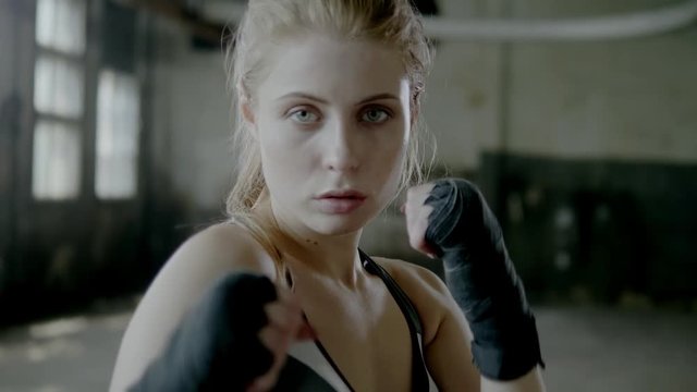 Female Boxer training in Boxing Club