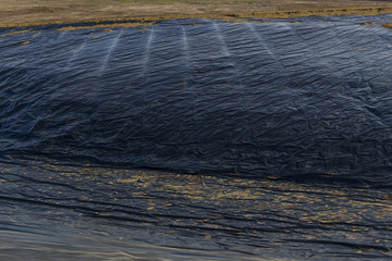plastic underground waterproofing in the construction of a reservoir for the primary treatment of...