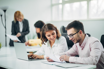 Business team working on a project in office