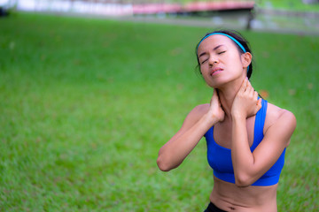 Naklejka na ściany i meble Athlete girl having sore neck after exercise, sport women health