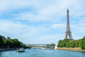 Obraz premium PARIS, France - JUNE 23, 2018 : the Eiffel Tower on Summer, 2018 in Paris. Eiffel tower is the most popular travel place and global cultural icon of the France and the world.