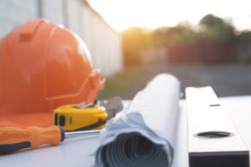 Fototapeta premium Architect desk ,Business,engineering concept,construction site, soft focus, vintage tone, working with blueprints in the office