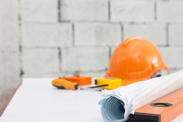 Fototapeta premium Architect desk ,Business,engineering concept,construction site, soft focus, vintage tone, working with blueprints in the office