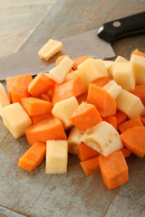 preparing chopped carrot swede and turnip