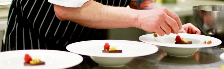 Fototapeta na wymiar chef plating chocolate dessert