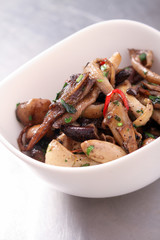 pan fried mushrooms in ceramic dish
