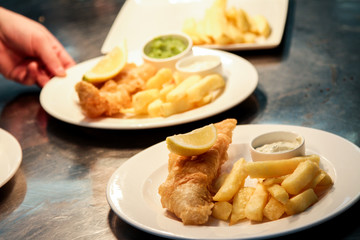serving fish and chips