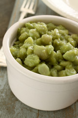 traditional mushy peas in white dish