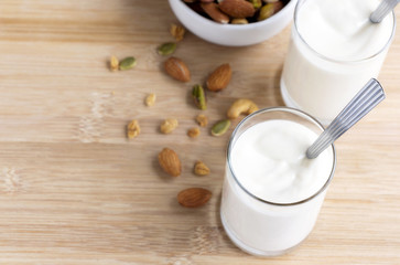 Yogurt in two glasses with dried fruit is a healthy breakfast.