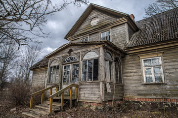 Deteriorated abandoned haunted old house.