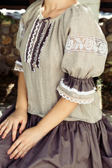 Fototapeta na wymiar Linen dress, sleeve, lace and embroidery, natural fabric, folk style