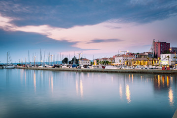 Cityscape of Koper in Slovenia after sunset at dusk - obrazy, fototapety, plakaty