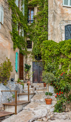 Fototapeta na wymiar Old buildings and narrow streets in the picturesque medieval city of Eze Village in the South of France along the Mediterranean Sea