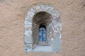 Fototapeta na wymiar Small church window in Echternach, Luxembourg