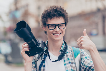 Naklejka premium Portrait of curly haired cute attractive handsome smiling guy ne