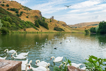 St Margaret’s Loch with ruins of St Anthony’s chapel in the background, Edinburgh, Scotland.