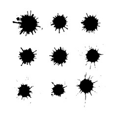 Black ink blots isolated on white background. Splashes texture.
