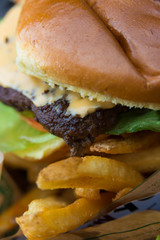 Delicious fresh burger close up. Selective focus with shallow depth of field