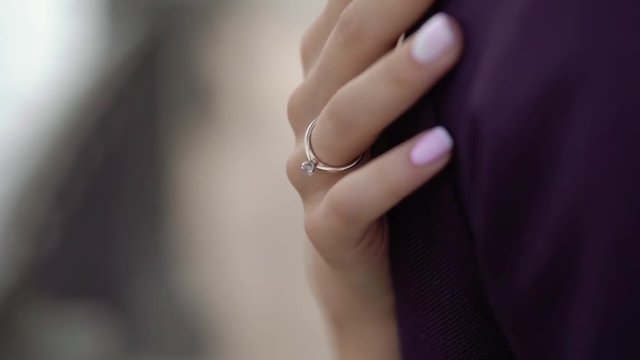 Woman bride embracing man wit hand ring on a finger