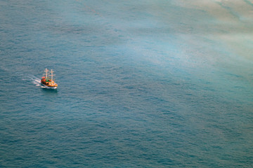 Mediterranean sea Pirate ship with tourists at sea.