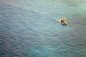 Mediterranean sea Pirate ship with tourists at sea.