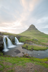 waterfall in iceland in the mountain