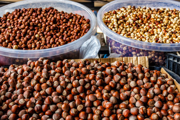 Nut background of hazelnut fruits. Food background. Top view of hazelnut nuts.