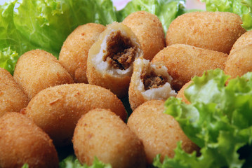 Delicious Brazilian snack, cassava and meat