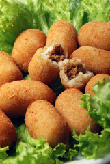 Delicious Brazilian snack, cassava and meat