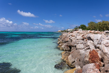 View at rugged rocky seashore at anguilla, island in caribbean sea - obrazy, fototapety, plakaty