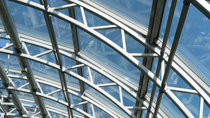 Structures of skylight glass roof window and blue sky
