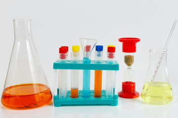 Tools and equipment for chemical studies on a white background