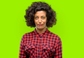 Beautiful arab woman making funny face fooling