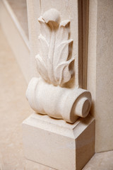 Carved white stone acanthus leaf corbel bracket detail on fireplace surround © Olexandr Tytarchuk