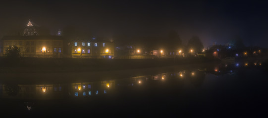 Old city of Porvoo at night in fog