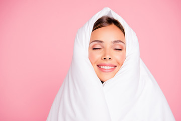 Portrait of young gorgeous smiling lady covered wrapped in blank