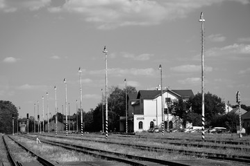 Hostivice, Czech republic - August 16, 2018: building of train station, lamps, tracks and parked...