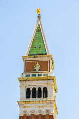 View on the bell tower of the San Marco Basilica in Venice, Italy on a sunny day.