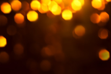Abstract blurred orange bokeh background. Holiday theme
