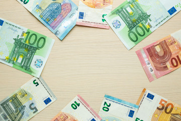 Euro banknotes on the table. Top view.