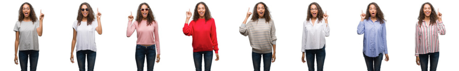 Composition of young brazilian woman isolated over white background pointing finger up with...