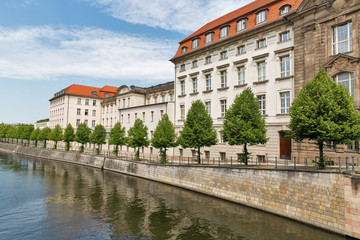 Fototapeta na wymiar Embankment of Berlin river near the Invalidenstrasse in Central Mitte district