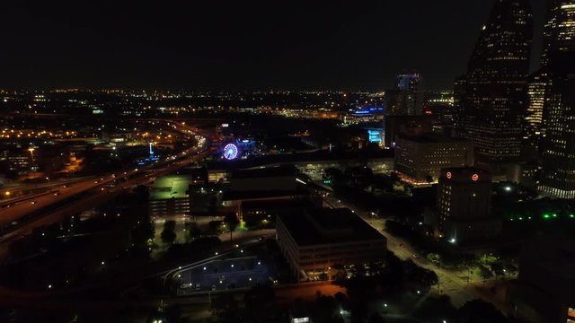 Downtown Houston at night and highways lit at night