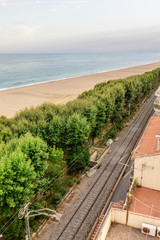 Sea bank in Costa Brava, Spain. Railway in mountains