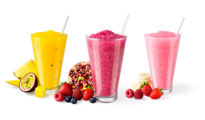 Three Flavors of Cold Fruit Juice Smoothies in Glasses with Straws and Garnishes on White Background