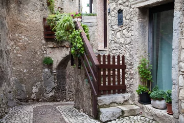 Fototapeten Mediterranes Europa Small town narrow street view with colorful houses in Malcesine  © erika8213