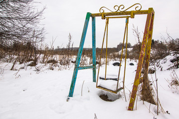 Old iron swings