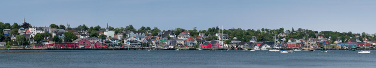 Fototapeta na wymiar Panorama of the Lunenburg waterfront and downtown from the other side of the harbor in Nova Scotia