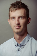 Obraz premium Portrait of a smart serious young man