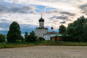 Evening melancholic sky over the famous Church of the Intercession of the Holy Virgin on the Nerl...